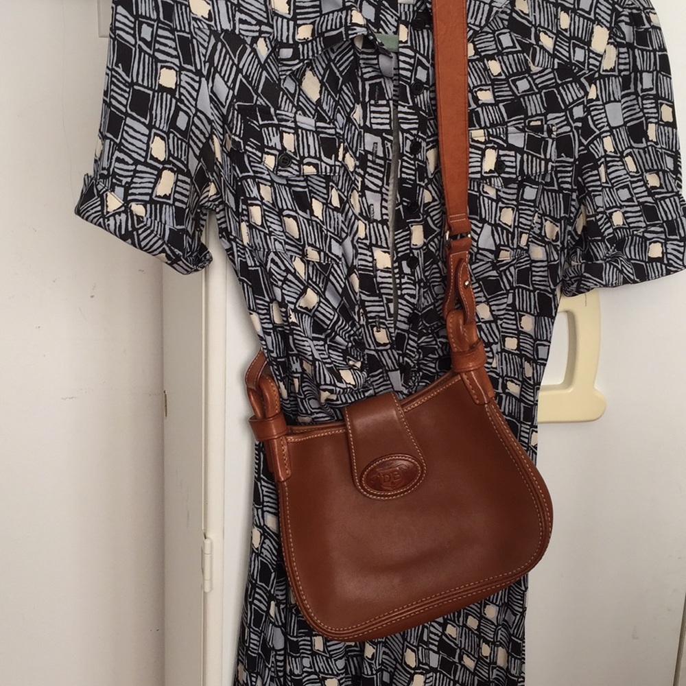 Vintage Dooney & Bourke shoulder saddle bag.